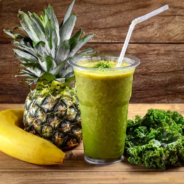 Phil’s Green Island smoothie made with coconut milk, apple juice, sea moss, kale, banana, pineapple